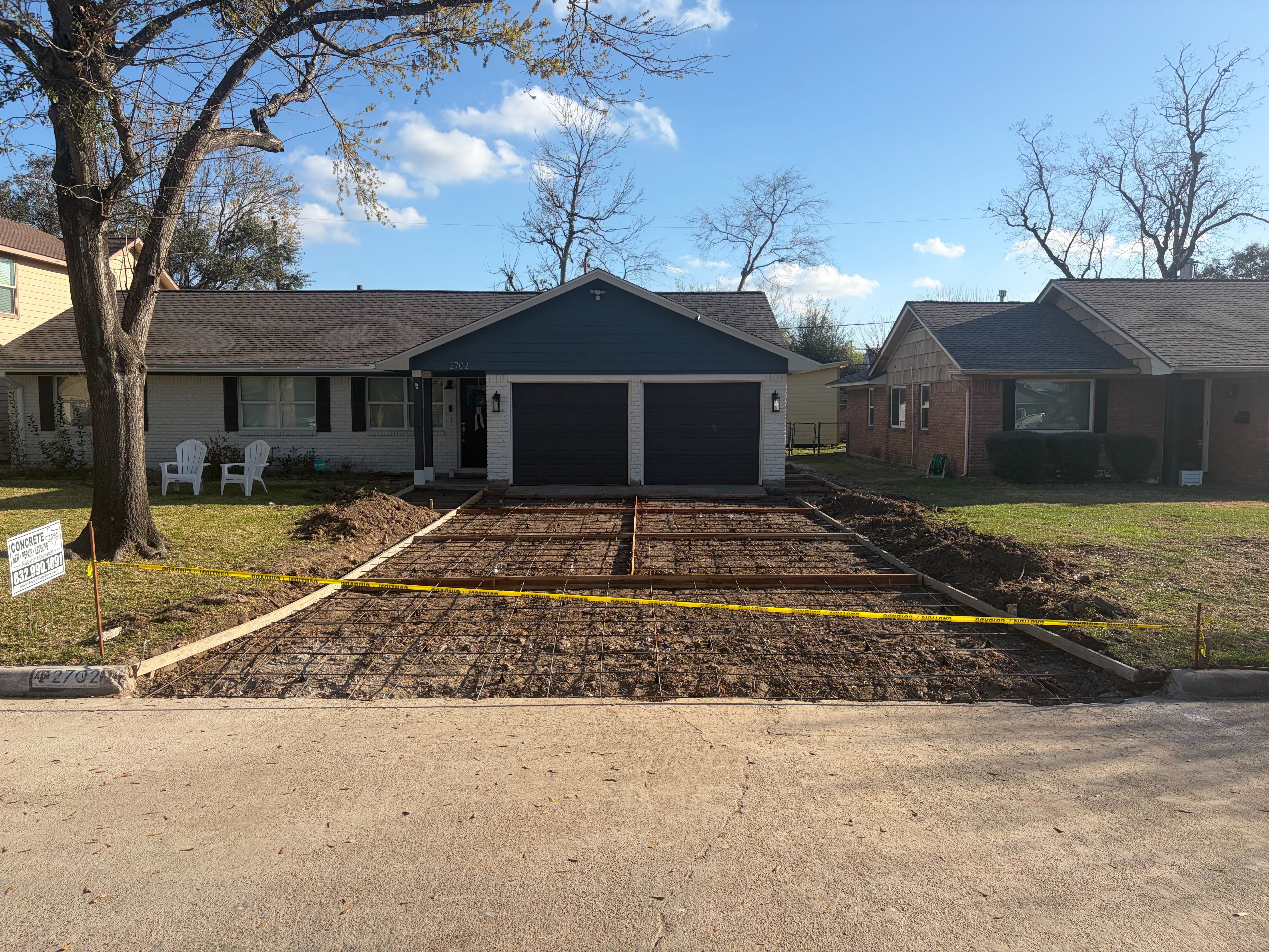 Driveway framing and rebar reinforcement preparation for new concrete pour in Houston Texas